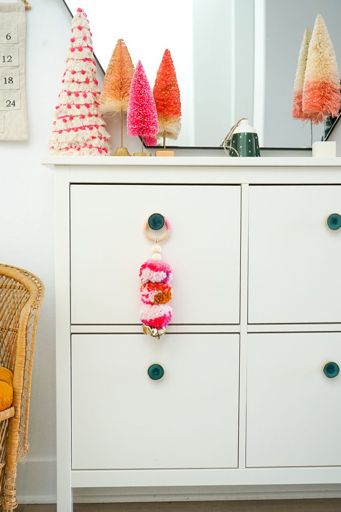 DIY Holiday Pom Pom Door Hanger